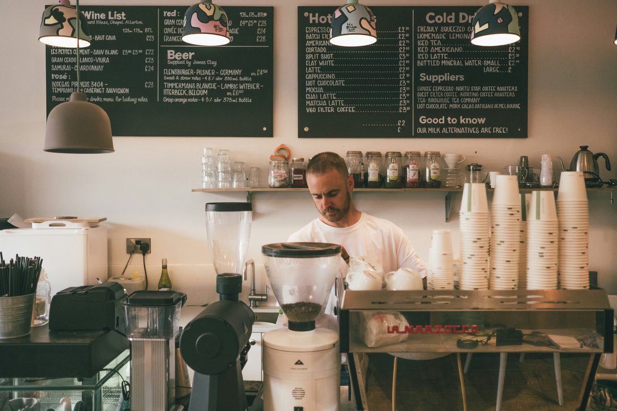Small business owner working behind the counter